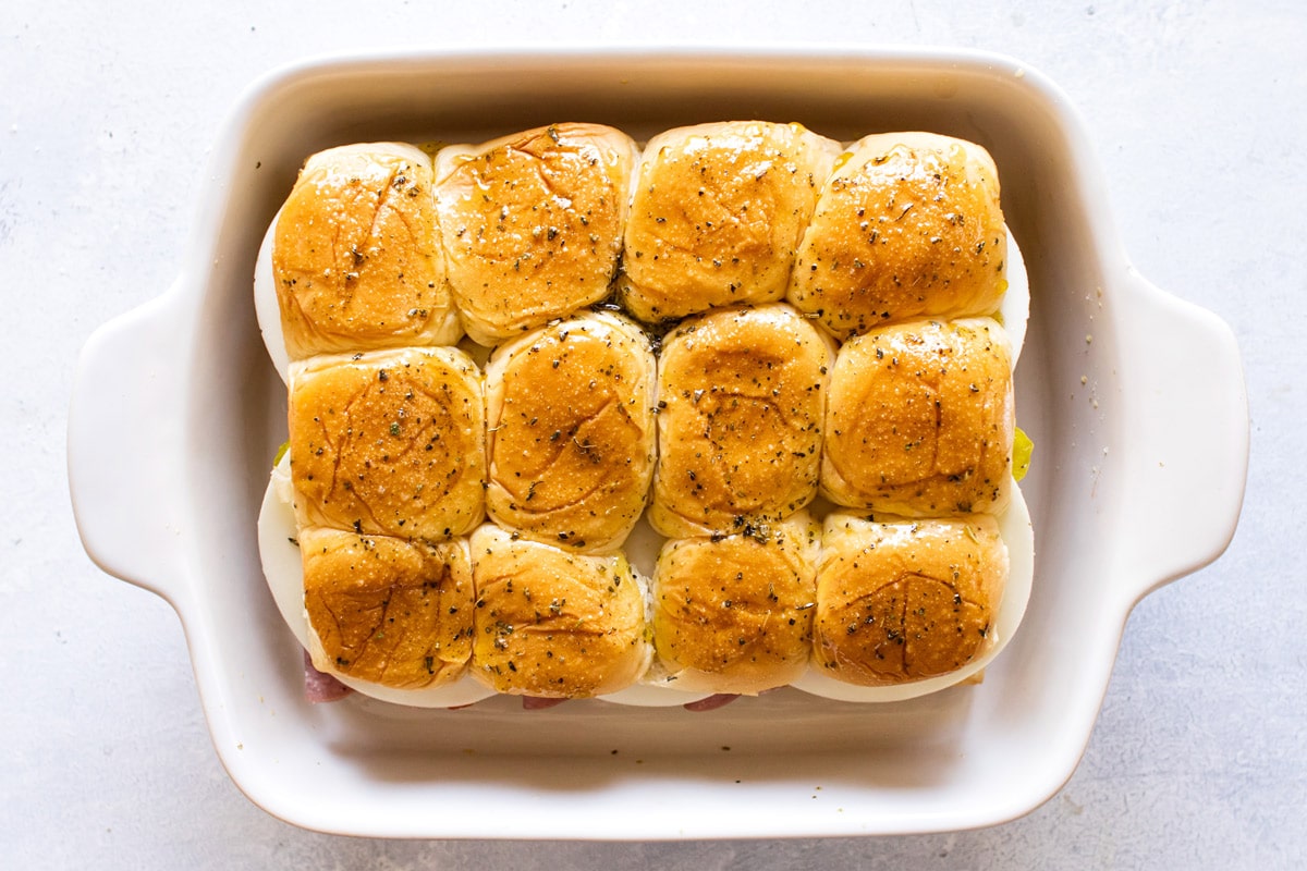 the top roll piece brushed with herbs and olive oil.