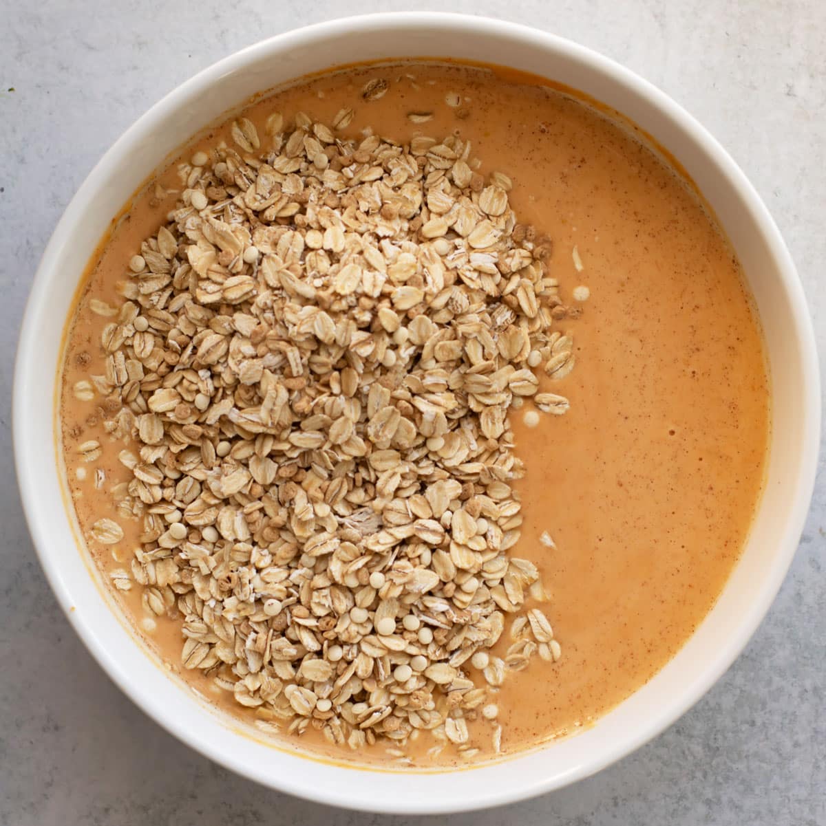 the oatmeal added to the milk and pumpkin mixture.
