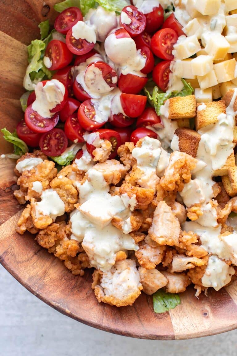the dressing drizzled over the crispy chicken.