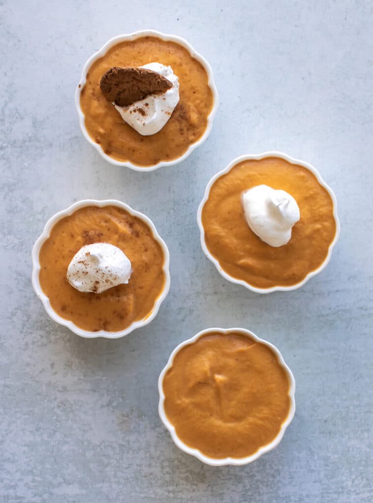 the puddings being garnished.