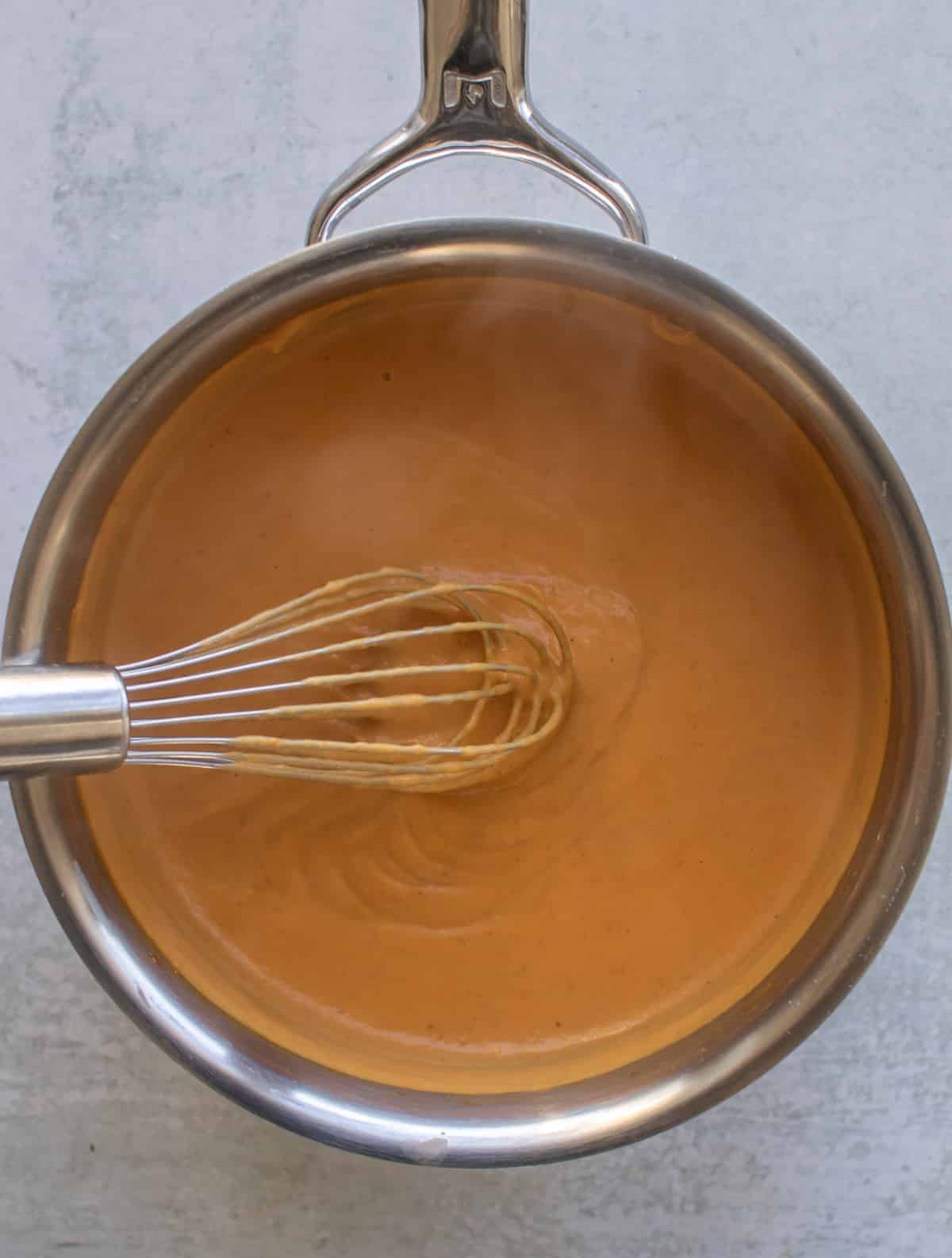 the pudding thickened in the pan.