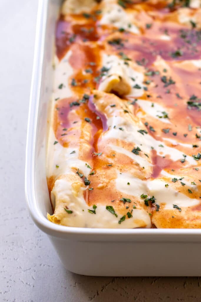 the baked enchiladas in the pan.