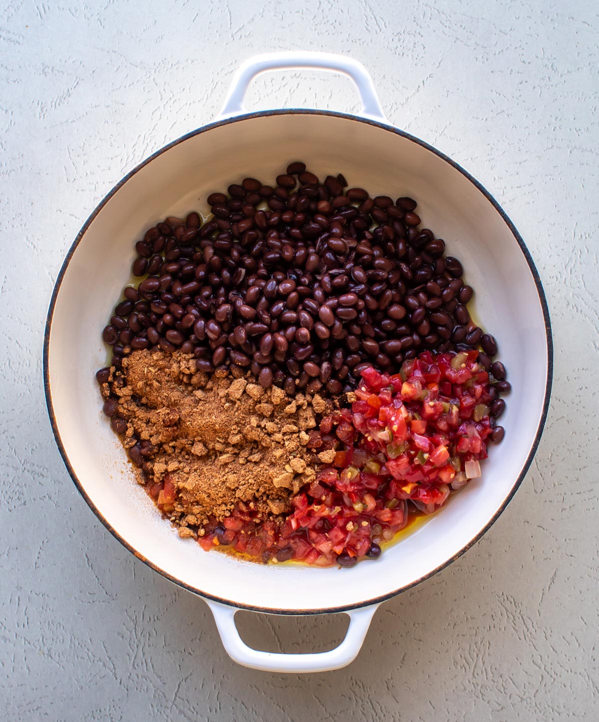 the black beans, taco seasoning, and pice de gallo in a pan.