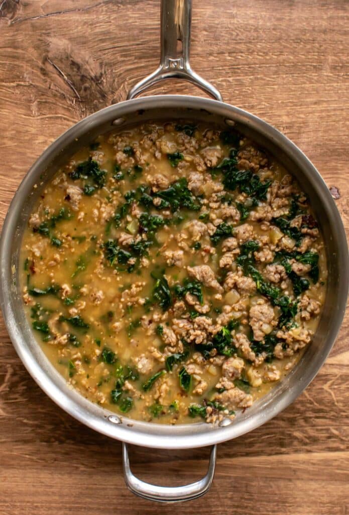 the broth added to the pan.