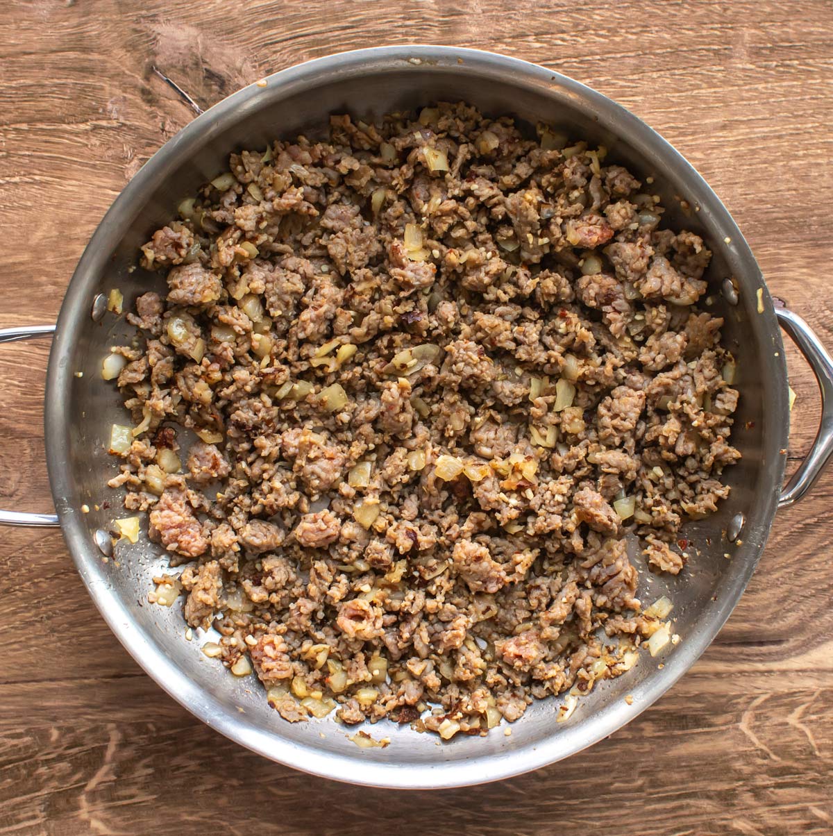 the browned sausage with onions and garlic.