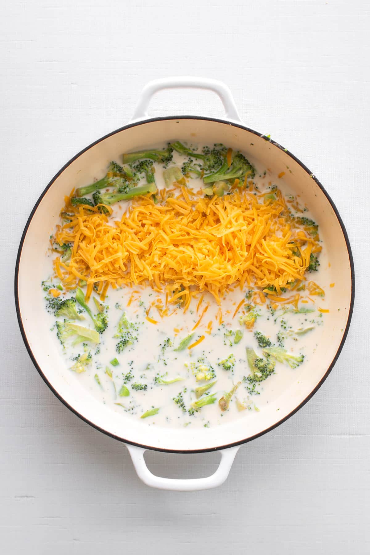 the cheese added to the pan.