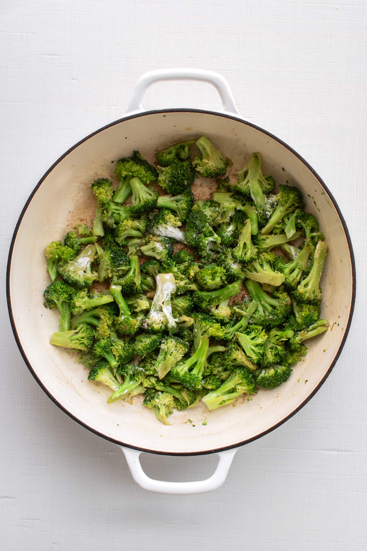 the broccoli and flour in the pan.