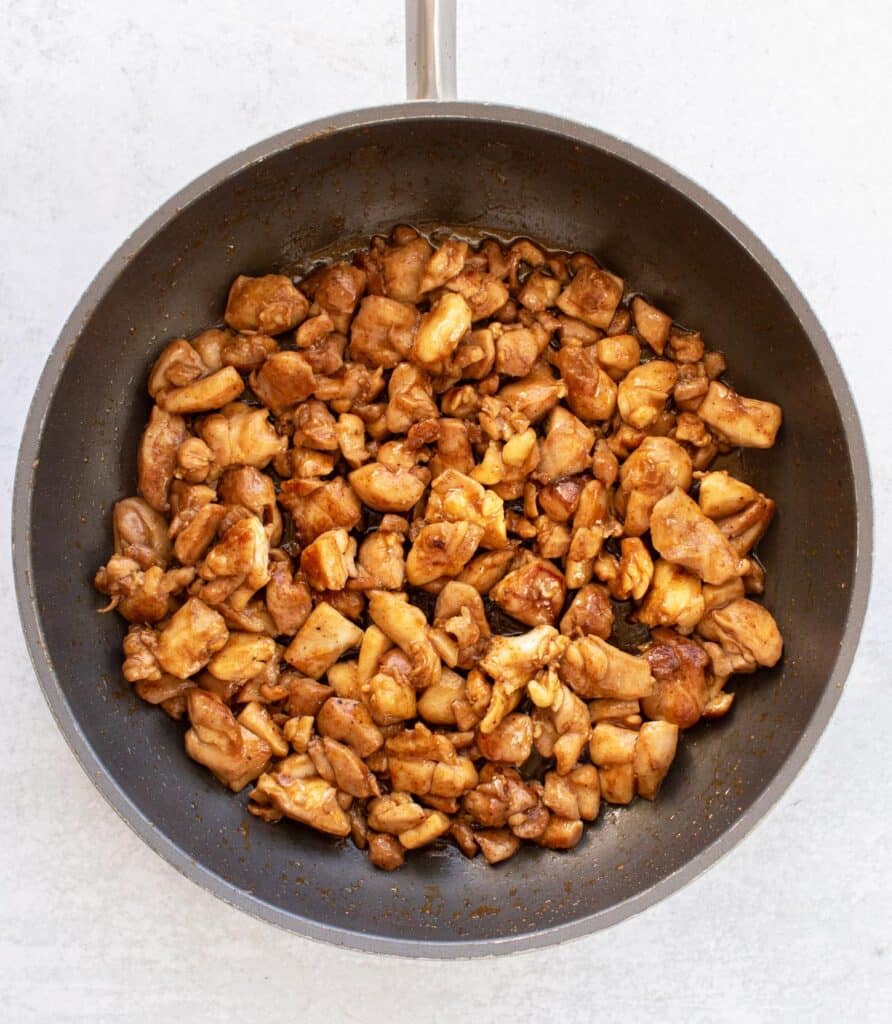the cooked chicken in the pan.